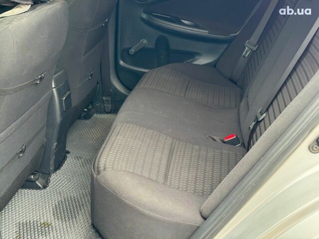 Сірий Тойота Королла, об'ємом двигуна 1.3 л та пробігом 137 тис. км за 7490 $, фото 15 на Automoto.ua