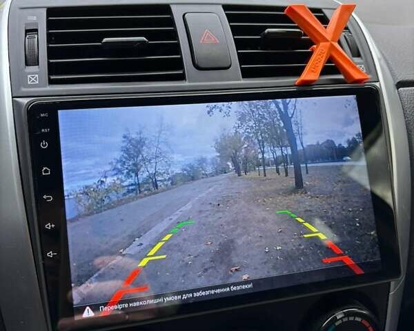 Сірий Тойота Королла, об'ємом двигуна 1.3 л та пробігом 253 тис. км за 7500 $, фото 39 на Automoto.ua