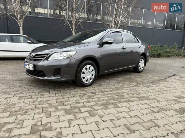 Серый Тойота Королла, объемом двигателя 1.33 л и пробегом 235 тыс. км за 7850 $, фото 1 на Automoto.ua