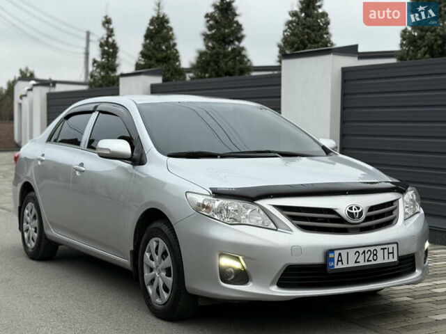 Сірий Тойота Королла, об'ємом двигуна 1.33 л та пробігом 138 тис. км за 7650 $, фото 1 на Automoto.ua