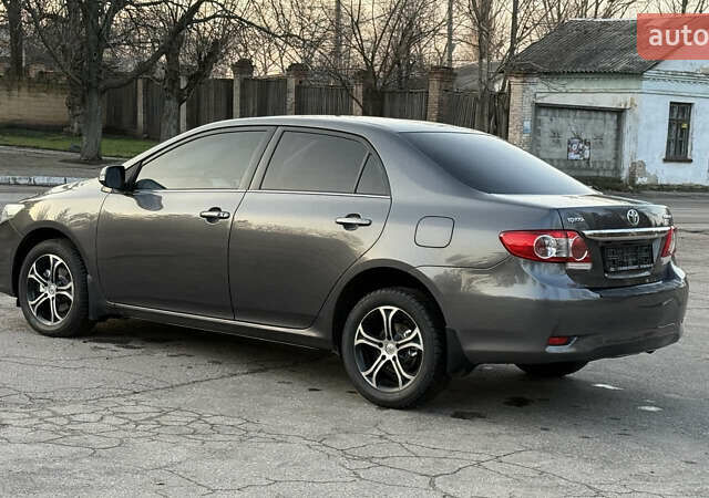Сірий Тойота Королла, об'ємом двигуна 1.6 л та пробігом 83 тис. км за 10700 $, фото 8 на Automoto.ua