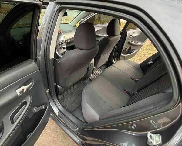 Сірий Тойота Королла, об'ємом двигуна 1.3 л та пробігом 253 тис. км за 7500 $, фото 16 на Automoto.ua