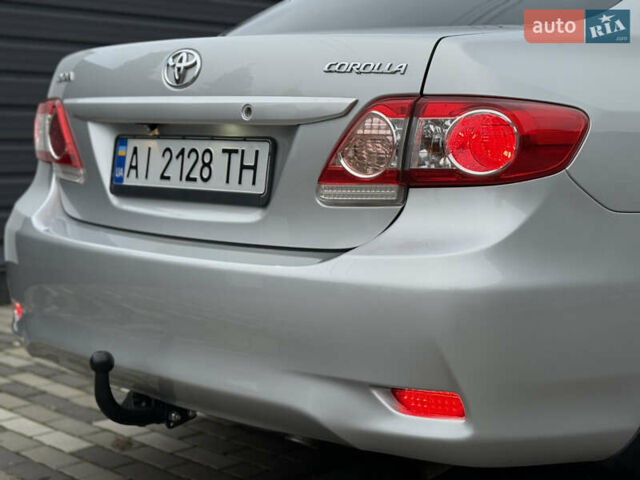 Сірий Тойота Королла, об'ємом двигуна 1.33 л та пробігом 138 тис. км за 7650 $, фото 9 на Automoto.ua
