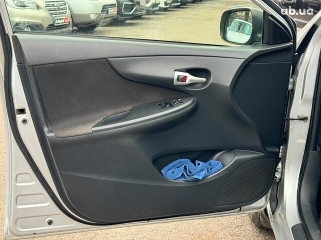 Сірий Тойота Королла, об'ємом двигуна 1.3 л та пробігом 137 тис. км за 7490 $, фото 10 на Automoto.ua