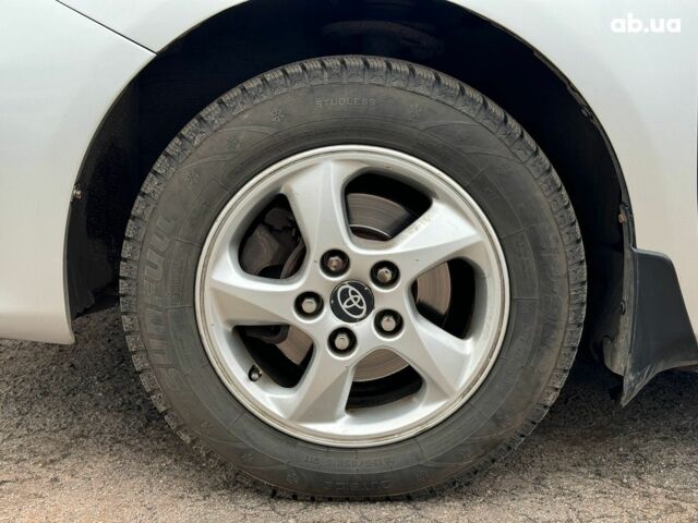 Сірий Тойота Королла, об'ємом двигуна 1.3 л та пробігом 137 тис. км за 7490 $, фото 9 на Automoto.ua