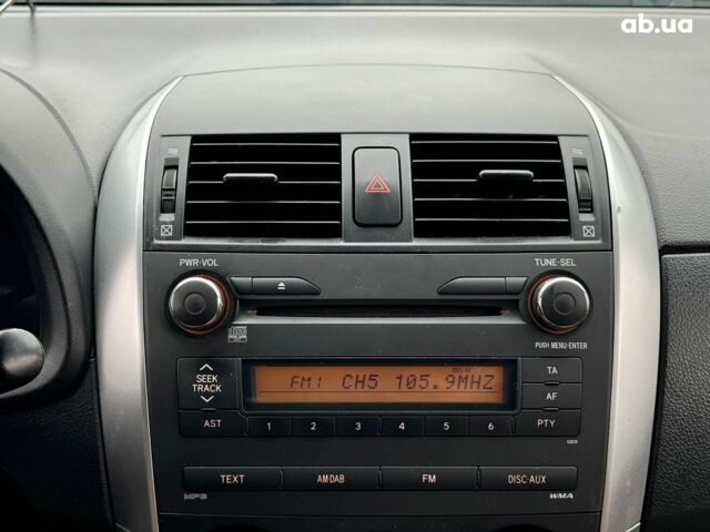 Сірий Тойота Королла, об'ємом двигуна 1.3 л та пробігом 137 тис. км за 7490 $, фото 23 на Automoto.ua