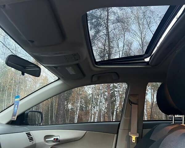 Сірий Тойота Королла, об'ємом двигуна 1.6 л та пробігом 51 тис. км за 11000 $, фото 6 на Automoto.ua