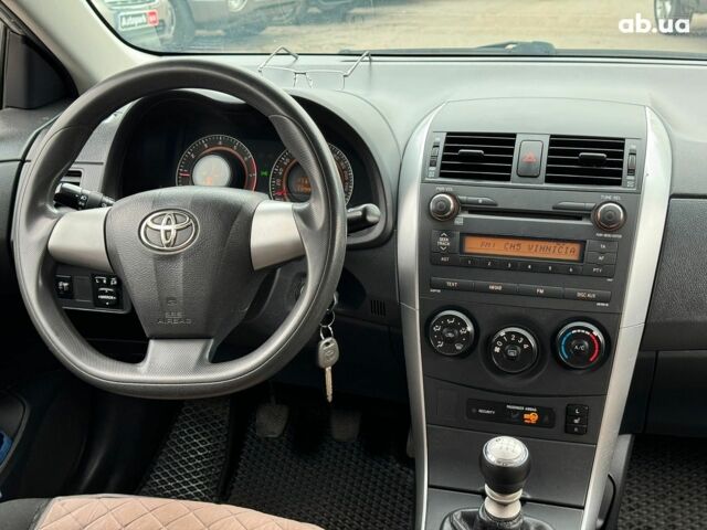 Сірий Тойота Королла, об'ємом двигуна 1.3 л та пробігом 137 тис. км за 7490 $, фото 20 на Automoto.ua