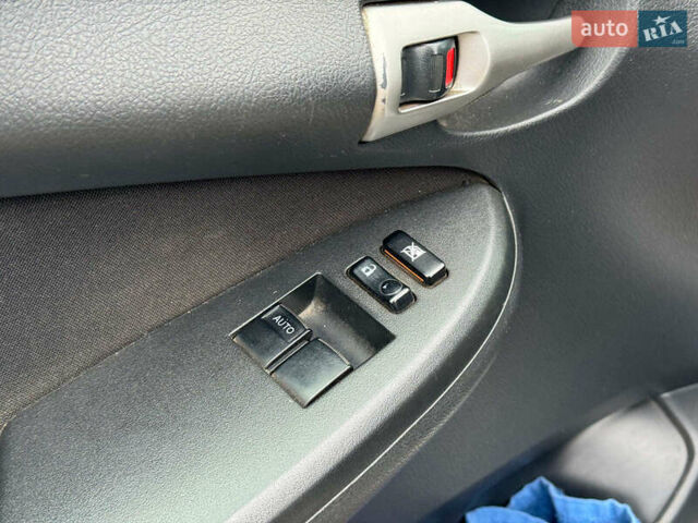 Серый Тойота Королла, объемом двигателя 1.3 л и пробегом 137 тыс. км за 7490 $, фото 12 на Automoto.ua