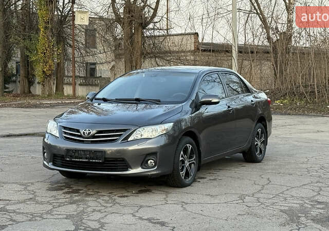 Сірий Тойота Королла, об'ємом двигуна 1.6 л та пробігом 83 тис. км за 10700 $, фото 1 на Automoto.ua