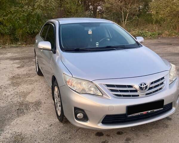 Сірий Тойота Королла, об'ємом двигуна 1.6 л та пробігом 229 тис. км за 9500 $, фото 1 на Automoto.ua