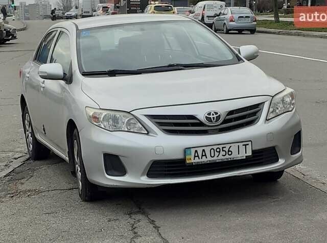 Сірий Тойота Королла, об'ємом двигуна 1.33 л та пробігом 156 тис. км за 9000 $, фото 2 на Automoto.ua