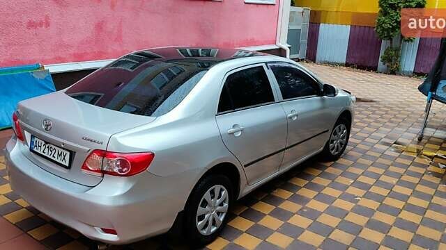 Серый Тойота Королла, объемом двигателя 1.33 л и пробегом 169 тыс. км за 7500 $, фото 9 на Automoto.ua