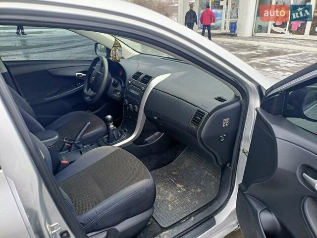 Серый Тойота Королла, объемом двигателя 1.33 л и пробегом 140 тыс. км за 7600 $, фото 6 на Automoto.ua