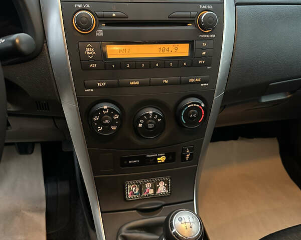 Серый Тойота Королла, объемом двигателя 1.33 л и пробегом 154 тыс. км за 7800 $, фото 14 на Automoto.ua