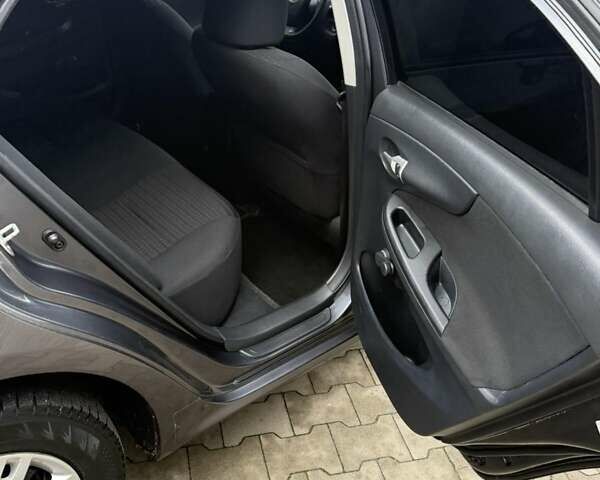 Серый Тойота Королла, объемом двигателя 1.33 л и пробегом 235 тыс. км за 7850 $, фото 26 на Automoto.ua