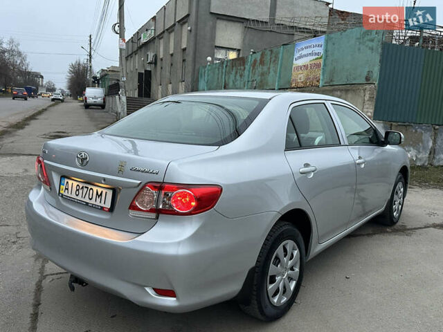 Серый Тойота Королла, объемом двигателя 1.33 л и пробегом 154 тыс. км за 7800 $, фото 4 на Automoto.ua