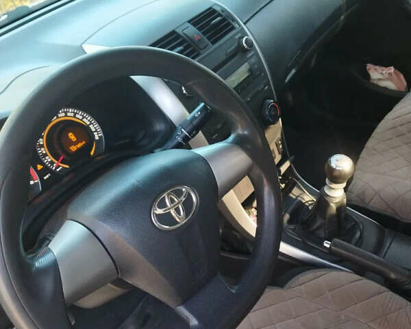 Серый Тойота Королла, объемом двигателя 1.33 л и пробегом 190 тыс. км за 7000 $, фото 7 на Automoto.ua