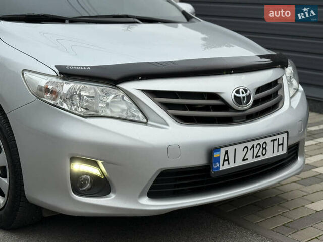 Сірий Тойота Королла, об'ємом двигуна 1.33 л та пробігом 138 тис. км за 7650 $, фото 3 на Automoto.ua