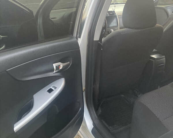 Сірий Тойота Королла, об'ємом двигуна 1.6 л та пробігом 229 тис. км за 9500 $, фото 18 на Automoto.ua