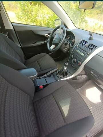 Серый Тойота Королла, объемом двигателя 1.33 л и пробегом 93 тыс. км за 8700 $, фото 1 на Automoto.ua