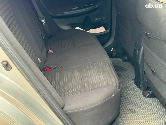 Сірий Тойота Королла, об'ємом двигуна 1.3 л та пробігом 137 тис. км за 7490 $, фото 17 на Automoto.ua