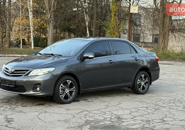 Сірий Тойота Королла, об'ємом двигуна 1.6 л та пробігом 83 тис. км за 10700 $, фото 2 на Automoto.ua