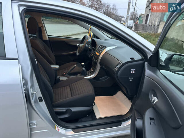 Серый Тойота Королла, объемом двигателя 1.33 л и пробегом 154 тыс. км за 7800 $, фото 52 на Automoto.ua