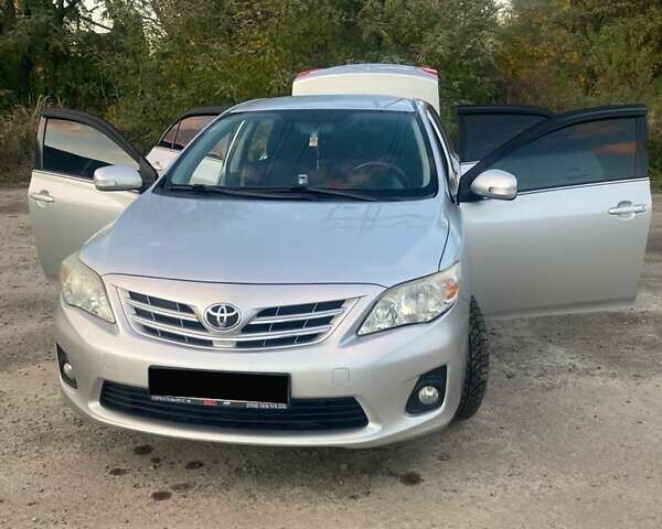 Сірий Тойота Королла, об'ємом двигуна 1.6 л та пробігом 229 тис. км за 9500 $, фото 6 на Automoto.ua