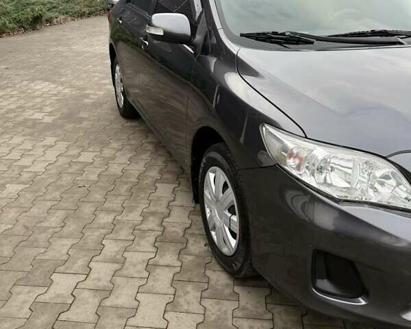 Серый Тойота Королла, объемом двигателя 1.33 л и пробегом 235 тыс. км за 7850 $, фото 6 на Automoto.ua