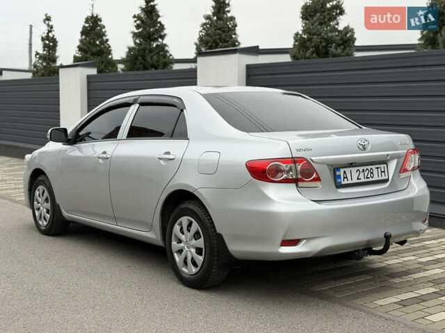 Сірий Тойота Королла, об'ємом двигуна 1.33 л та пробігом 138 тис. км за 7650 $, фото 7 на Automoto.ua