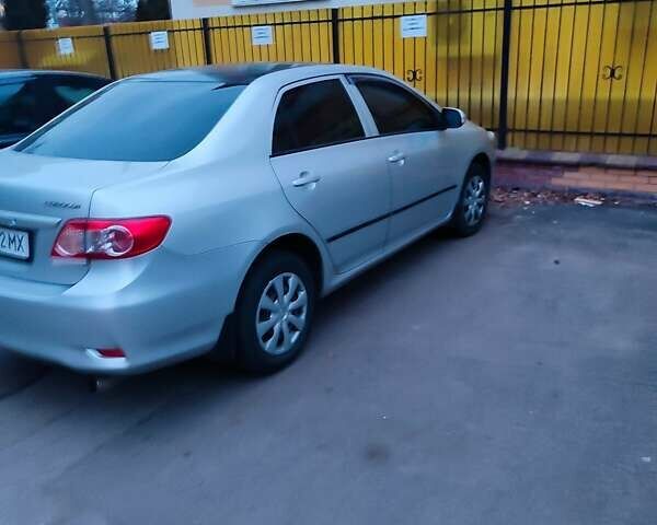 Серый Тойота Королла, объемом двигателя 1.33 л и пробегом 169 тыс. км за 7500 $, фото 23 на Automoto.ua