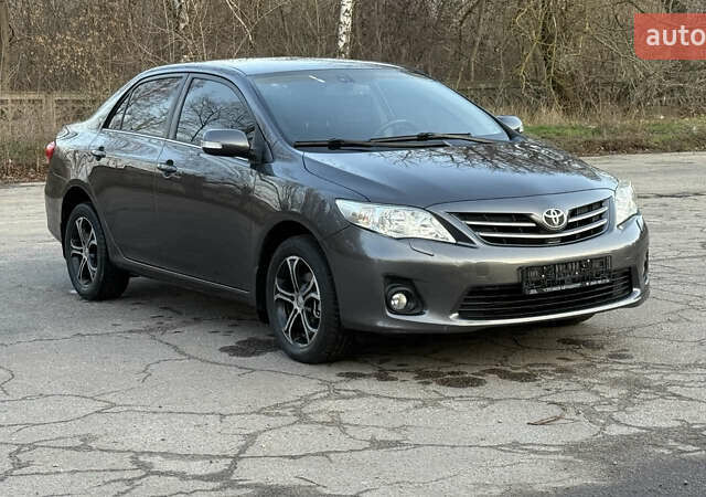 Сірий Тойота Королла, об'ємом двигуна 1.6 л та пробігом 83 тис. км за 10700 $, фото 3 на Automoto.ua