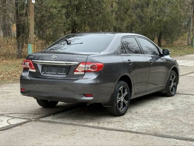Серый Тойота Королла, объемом двигателя 1.6 л и пробегом 83 тыс. км за 10700 $, фото 5 на Automoto.ua