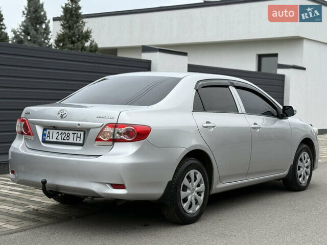 Сірий Тойота Королла, об'ємом двигуна 1.33 л та пробігом 138 тис. км за 7650 $, фото 8 на Automoto.ua