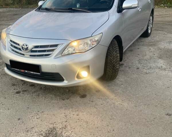 Сірий Тойота Королла, об'ємом двигуна 1.6 л та пробігом 229 тис. км за 9500 $, фото 5 на Automoto.ua