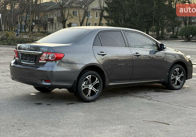Сірий Тойота Королла, об'ємом двигуна 1.6 л та пробігом 83 тис. км за 10700 $, фото 7 на Automoto.ua