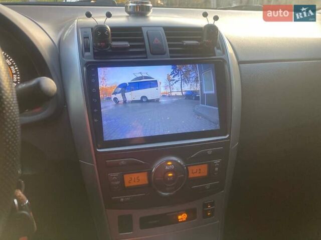 Сірий Тойота Королла, об'ємом двигуна 1.6 л та пробігом 229 тис. км за 9500 $, фото 11 на Automoto.ua
