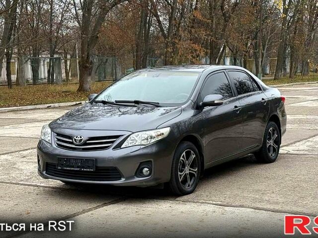 Серый Тойота Королла, объемом двигателя 1.6 л и пробегом 83 тыс. км за 10700 $, фото 2 на Automoto.ua