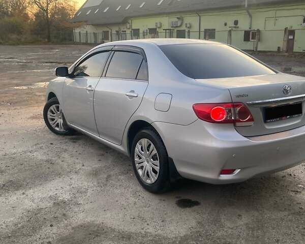 Сірий Тойота Королла, об'ємом двигуна 1.6 л та пробігом 229 тис. км за 9500 $, фото 4 на Automoto.ua