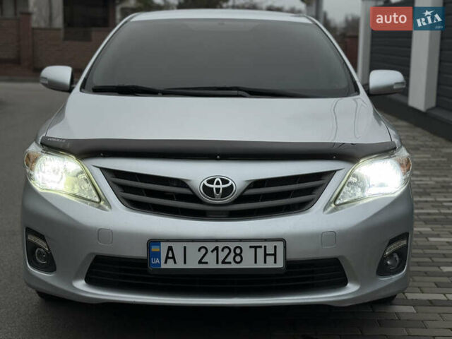 Сірий Тойота Королла, об'ємом двигуна 1.33 л та пробігом 138 тис. км за 7650 $, фото 4 на Automoto.ua