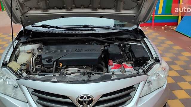 Серый Тойота Королла, объемом двигателя 1.33 л и пробегом 169 тыс. км за 7500 $, фото 17 на Automoto.ua