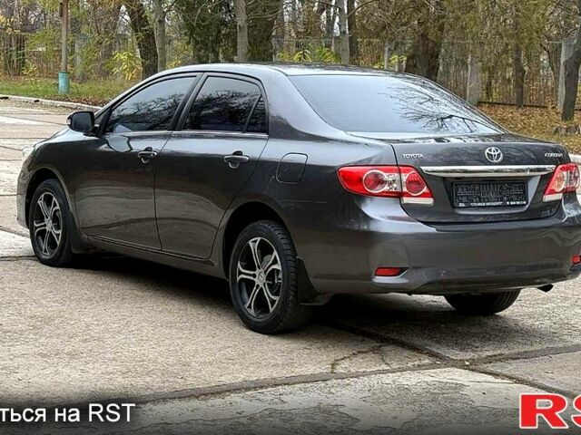 Серый Тойота Королла, объемом двигателя 1.6 л и пробегом 83 тыс. км за 10700 $, фото 5 на Automoto.ua