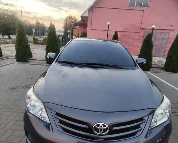 Серый Тойота Королла, объемом двигателя 1.33 л и пробегом 93 тыс. км за 8700 $, фото 9 на Automoto.ua