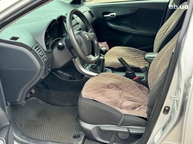 Сірий Тойота Королла, об'ємом двигуна 1.3 л та пробігом 137 тис. км за 7490 $, фото 12 на Automoto.ua