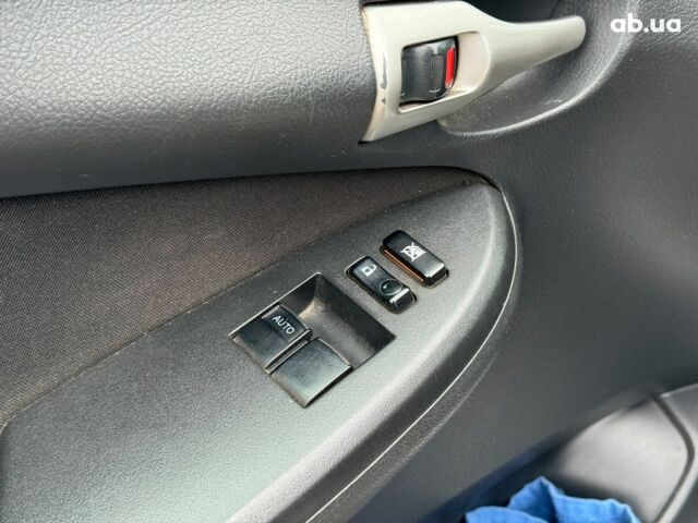 Сірий Тойота Королла, об'ємом двигуна 1.3 л та пробігом 137 тис. км за 7490 $, фото 11 на Automoto.ua