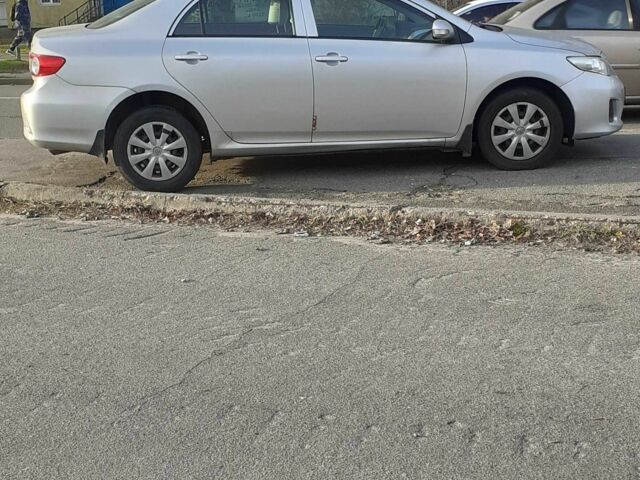 Сірий Тойота Королла, об'ємом двигуна 1.33 л та пробігом 156 тис. км за 9000 $, фото 1 на Automoto.ua