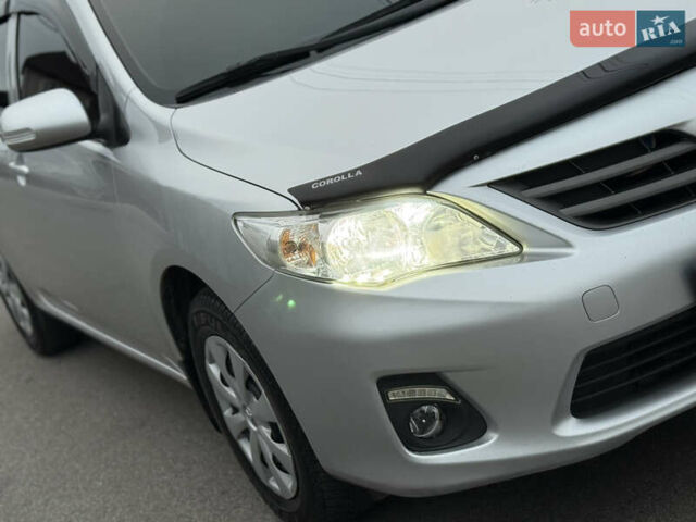 Сірий Тойота Королла, об'ємом двигуна 1.33 л та пробігом 138 тис. км за 7650 $, фото 5 на Automoto.ua