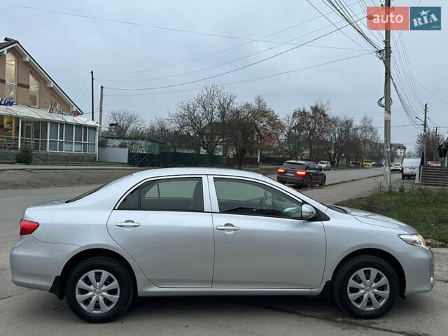 Серый Тойота Королла, объемом двигателя 1.33 л и пробегом 154 тыс. км за 7800 $, фото 3 на Automoto.ua