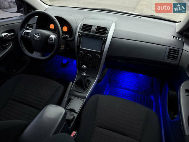 Сірий Тойота Королла, об'ємом двигуна 1.33 л та пробігом 138 тис. км за 7650 $, фото 27 на Automoto.ua